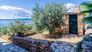 A stone building with a 'PRIVATE' sign, surrounded by olive trees and a stone pathway. - Villa Sea Edge - Three Bedroom Villa With Sea View (Orebic)