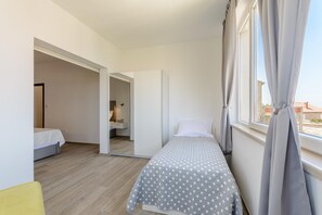 Apartamento | 2 dormitorios y tabla de planchar con plancha