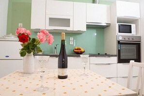 Apartment | Private kitchen | Fridge, microwave, oven, stovetop