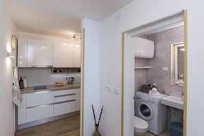 Apartment | Private kitchen | Fridge, microwave, stovetop, dishwasher