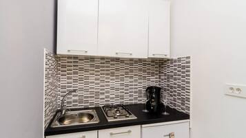 Apartment | Private kitchen | Fridge, stovetop, electric kettle