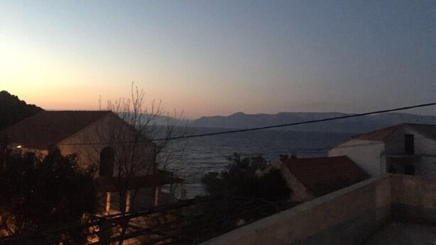 A coastal view with buildings and a clear sky. - Guest House Hazdovac Rooms - Two Bedroom Apartment With Terrace and Sea View (Mljet)