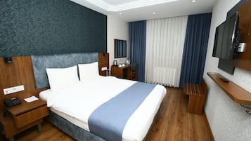 Standaard kamer, 1 twee- of 2 eenpersoonsbedden | Een minibar, gratis wifi