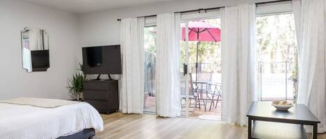 1 bedroom, desk, iron/ironing board, travel crib