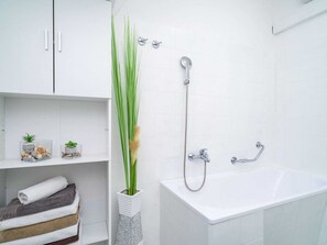 Departamento | Baño | Tina y secadora de cabello 