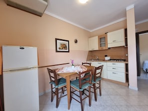 Appartement | Cuisine privée | Chaise haute