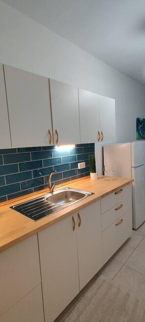 Apartment | Private kitchen | Fridge, microwave, oven, stovetop