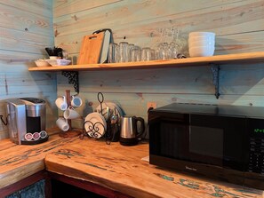Fridge, microwave, coffee/tea maker, toaster