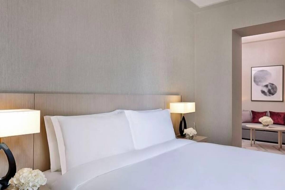 Premium bedding, down duvets, memory-foam beds, minibar