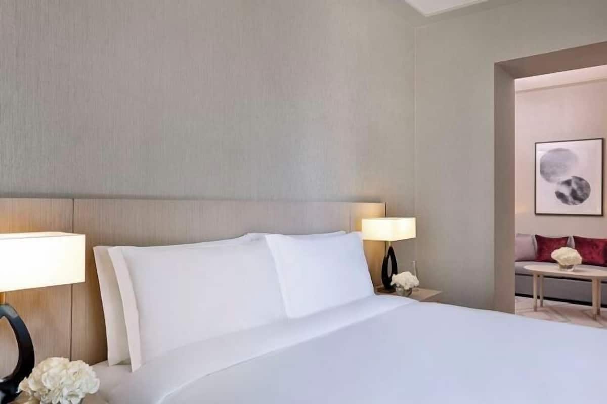 Premium bedding, down duvets, memory-foam beds, minibar