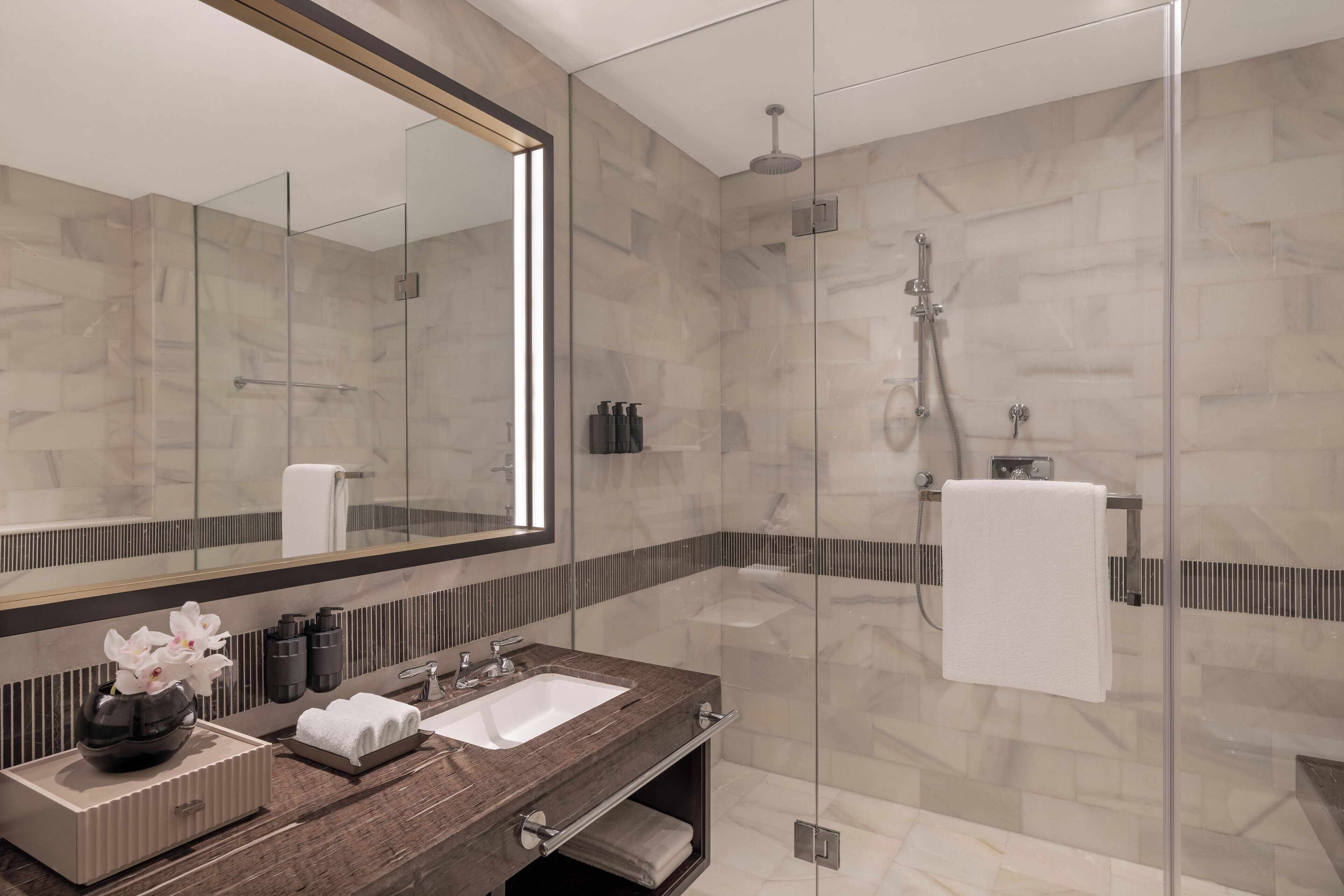 Bathtub, hair dryer, bathrobes, slippers