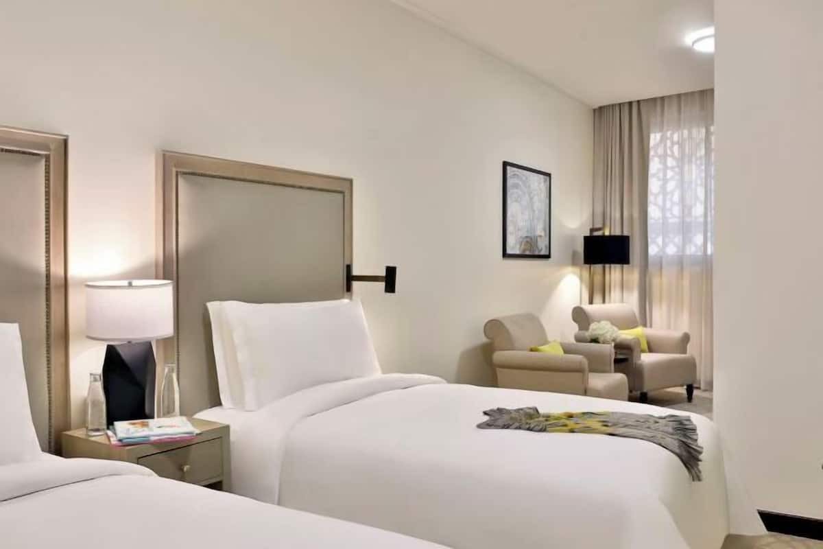 Premium bedding, down comforters, memory foam beds, minibar