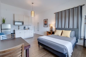 1 bedroom, desk, iron/ironing board, travel crib