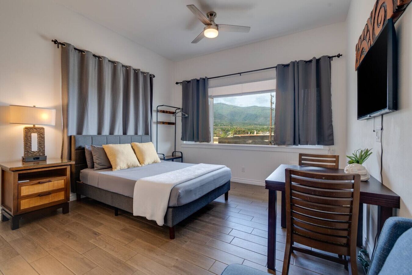 1 bedroom, desk, iron/ironing board, travel crib