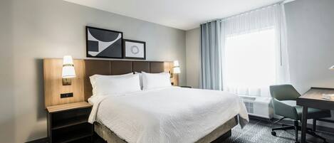 Down comforters, pillowtop beds, desk, laptop workspace