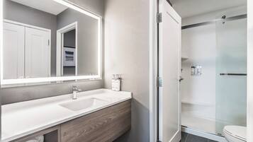 Designer toiletries, hair dryer, towels, soap