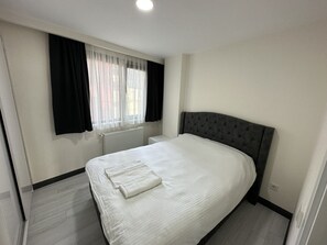 Chambre triple exécutive | Literie de qualité, accÚs au Wi-Fi (inclus), literie fournie