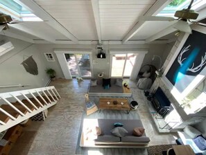 TV, fireplace, books, stereo