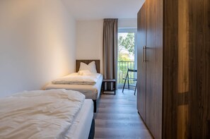 Apartamento | 2 quartos, individualmente mobiliados, roupa de cama