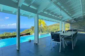 Outdoor dining - Coco Cannelle Prestige Villa Sea View with infinity pool (Above Grande Anse beach) (DESHAIES)