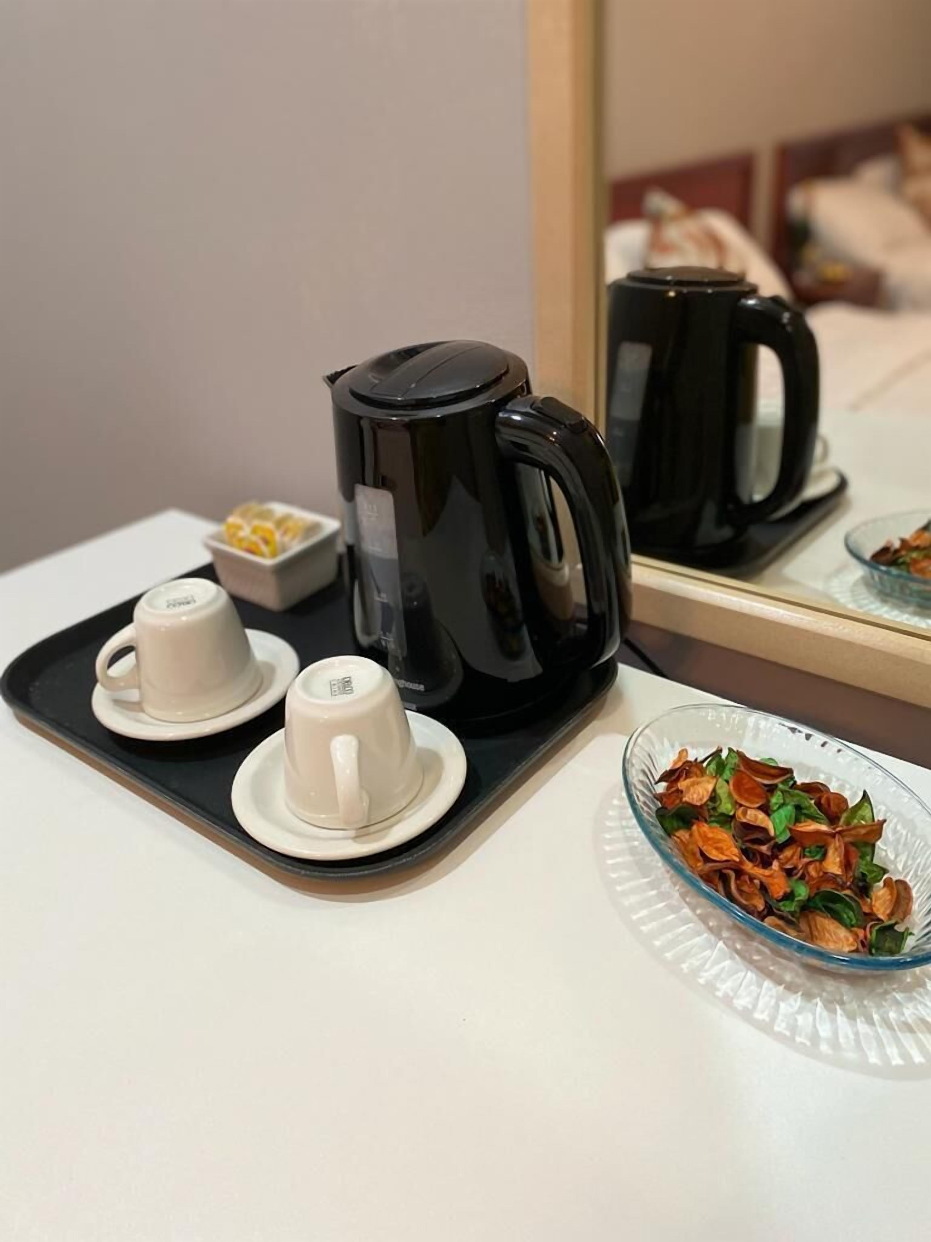 Deluxe tweepersoonskamer | Luxe beddengoed, een kluis op de kamer, een laptopwerkplek