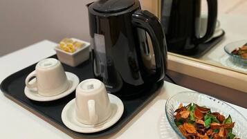 Deluxe tweepersoonskamer | Luxe beddengoed, een kluis op de kamer, een laptopwerkplek