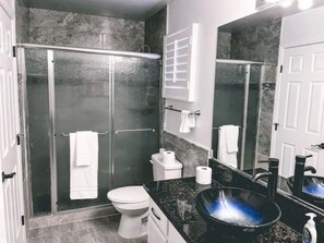 Hair dryer, towels, soap, shampoo