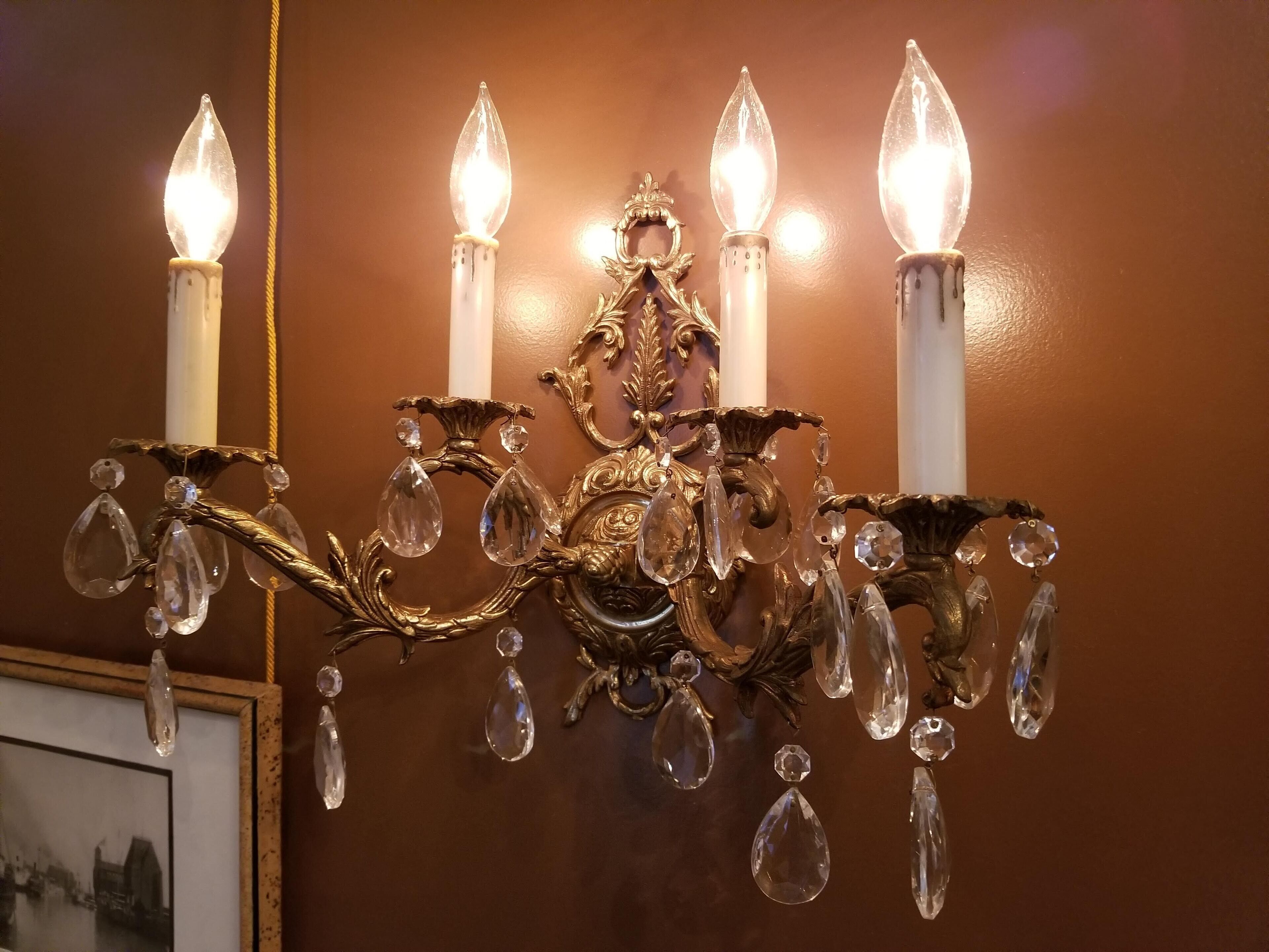 A chandelier with multiple lights and crystal decorations.