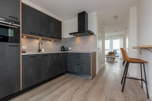 Leilighet | Eget kjøkken | Høy barnestol