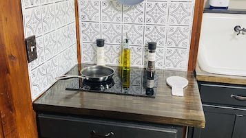 Fridge, microwave, stovetop, coffee/tea maker
