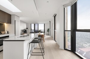 Three Bedroom Apartment | Private kitchen | Full-size fridge, microwave, oven, dishwasher