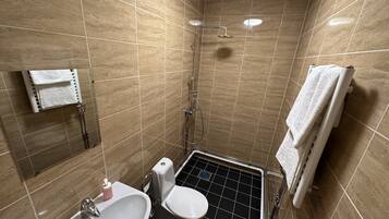 Classic Studio | Bathroom | Shower, towels