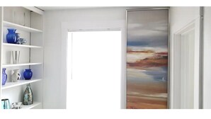 A hallway with a white door, a shelf with decorative vases, and a large abstract painting on the wall.