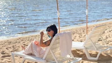 Private beach, sun loungers, beach towels