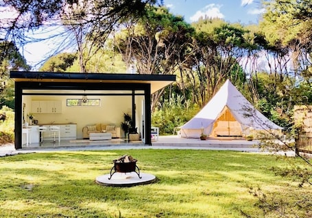 Terrace/patio. Ngataki Retreat Glamping at its finest