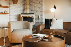 Fireplace - Peaceful Getaway in Joshua Tree | Remote, Hot Tub + Fire Pit (San Bernardino County)