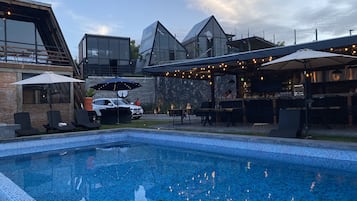 Outdoor pool, sun loungers