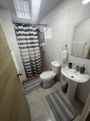 Shower, towels, soap, shampoo