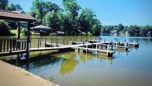 A calm lake with wooden docks and a gazebo. - 15 Fisher's Paradise on Lake Saluda w Boat Ramp (Greenville)