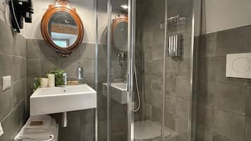 Comfort Room | Bathroom | Shower, rainfall showerhead, hair dryer, towels