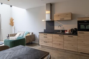 Maison | Cuisine privée | Four à micro-ondes, surface de cuisson
