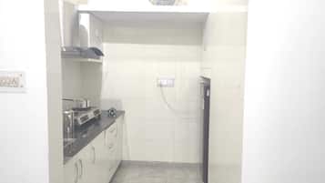 Fridge, stovetop, cookware/dishes/utensils