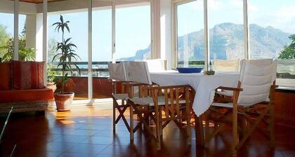 Villa Igina: A welcoming apartment that covers the entire ground floor of a villa in a quiet position, located on a hillside above the sea, with Free WI-FI.