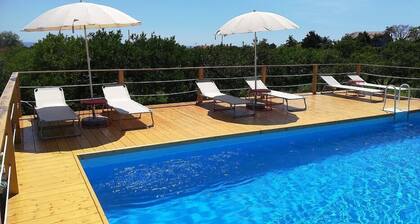 Villa Dianto: A welcoming two-story apartment that is part of an ancient country house surrounded by a citrus garden, with Free WI-FI.