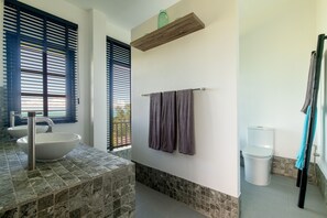 A bathroom with a marble sink, a toilet, and a window with blinds. - Picturesque 4br Cape Yamu  Pool Villa (Pa Klok)