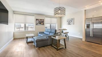 Comfort Condo, 1 Bedroom, Private Bathroom | Living room | 55-inch flat-screen TV with satellite channels, TV, Netflix
