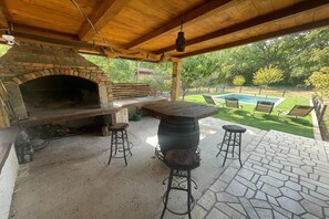 Outdoor dining - Vacation home with private swimming pool (Grizane)