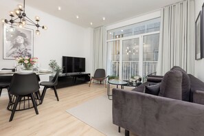 Apartamento, 1 quarto, sacada | Sala de estar