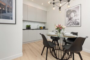 Apartment, 1 Bedroom, Balcony | Private kitchenette | Microwave, electric kettle, freezer, dining tables - Bracka Fashion Apartment by Renters (Warsaw)