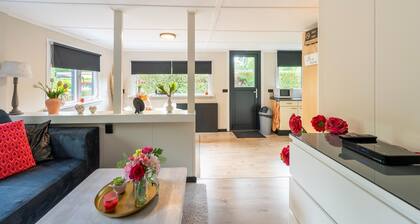 Lovely Wooden Chalet With Garden in Reutum